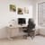 Stratford executive office chair placed at a modern desk in a bright office environment