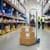 BT-HT90 Folding Sack Truck – 90kg Aluminium Trolley - With Boxes Stacked in Warehouse